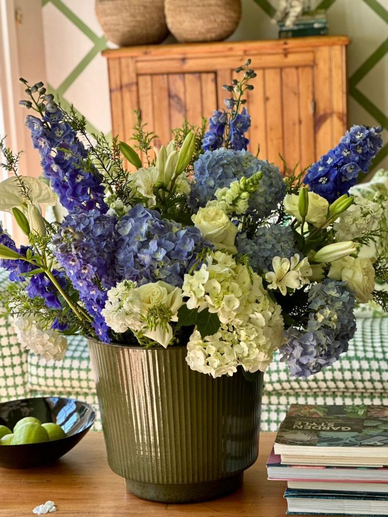 Blue hydrangea arrangement by Fresh Line Flora